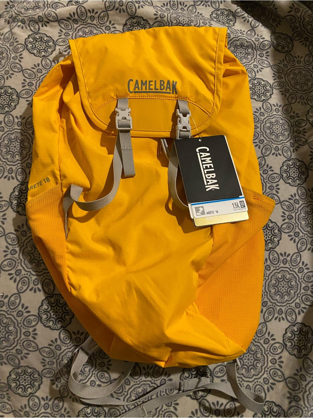 CamelBak Arete 18 hydration pack in Bright Yellow with Gray Straps